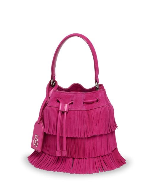 , RAE FRINGE MINI BUCKET BAG, Novedades, , Stuart Weitzman de color Pink