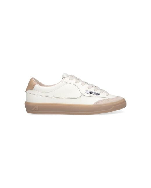 Autry White Low-Top Sneakers With Rounded Toe And Contrasting Heel Tab