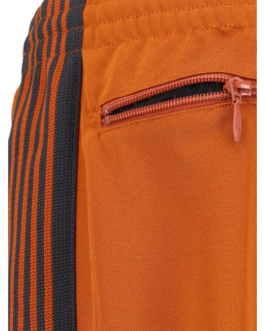 Pantaloni Sportivi " Track Pant" di Needles in Orange da Uomo