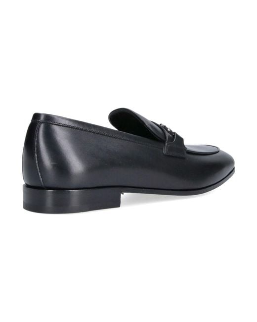 Ferragamo Black Gancini Round Toe Leather Loafers for men