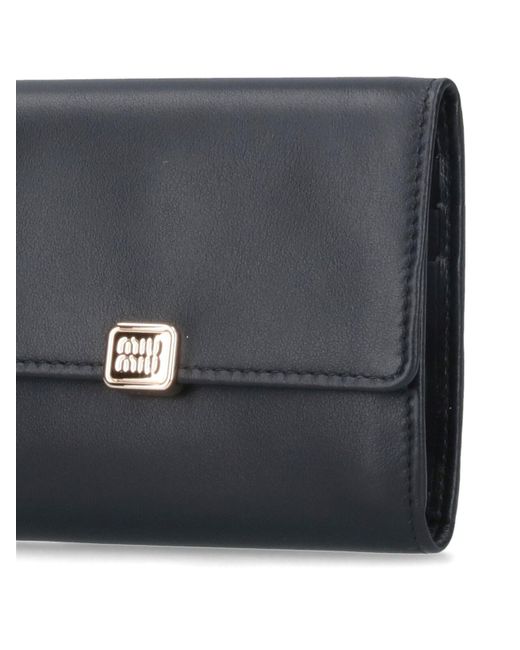 Miu Miu logo-lettering Compact Wallet | Black | FARFETCH