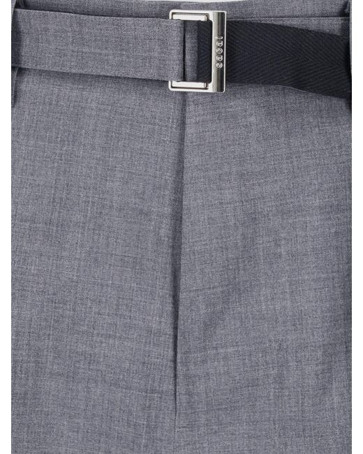 Sacai Blue Textured Wool-Blend Trousers for men