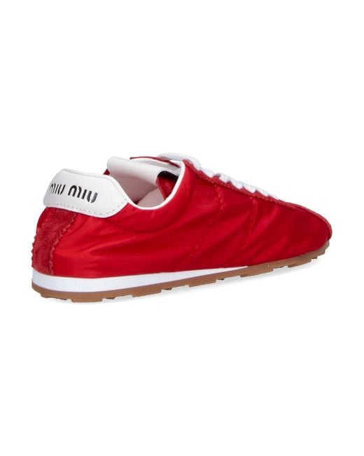 Miu Miu Red Sneakers "Plume"