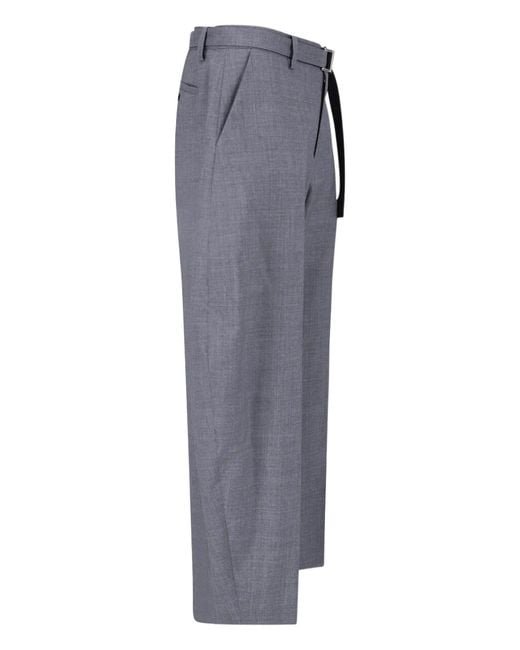 Sacai Blue Textured Wool-Blend Trousers for men