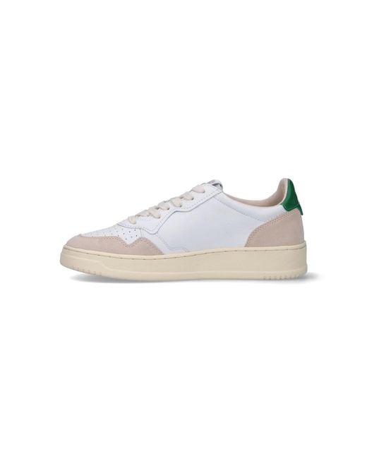 Autry White Low-Top Sneakers With Suede Accents And Embossed Details for men