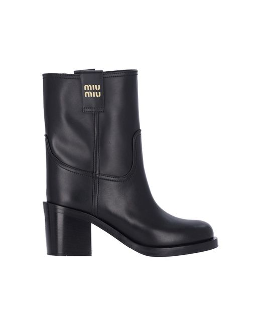 Miu Miu Logo Leather Ankle Boots in Black | Lyst