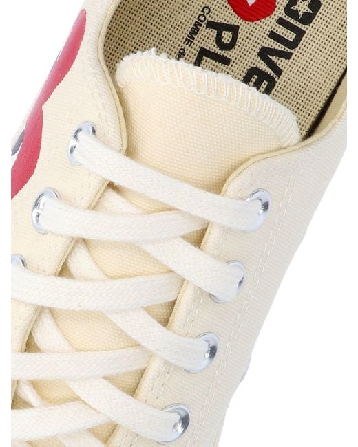 COMME DES GARÇONS PLAY Pink Low Top 'Converse Chuck 70' Sneakers