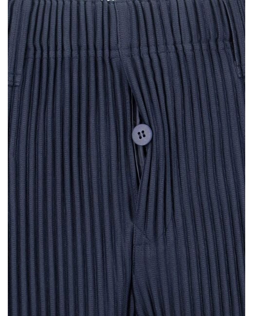 HOMME PLISSÉ Blue Pleated Trousers for men