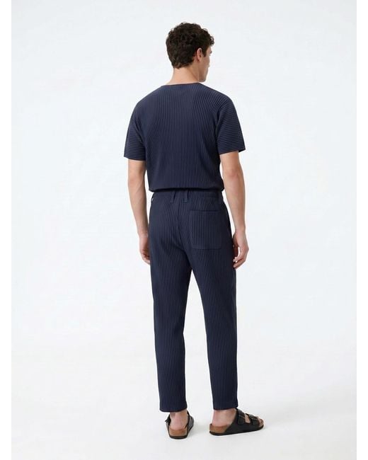 HOMME PLISSÉ Blue Pleated Pants for men