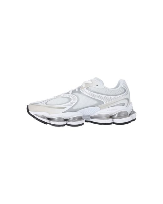 New Balance White Mesh Sneakers