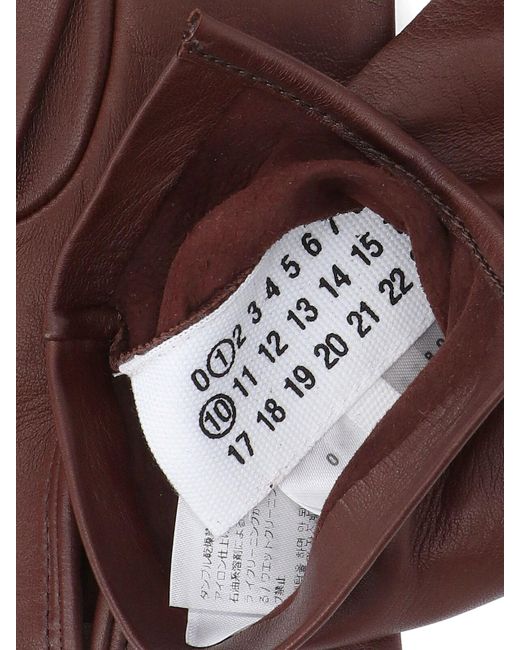 Guanti "Four Stitches" di Maison Margiela in Purple