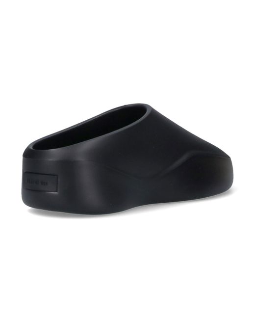 Mules "Eva Runner" di Fear Of God in Black da Uomo