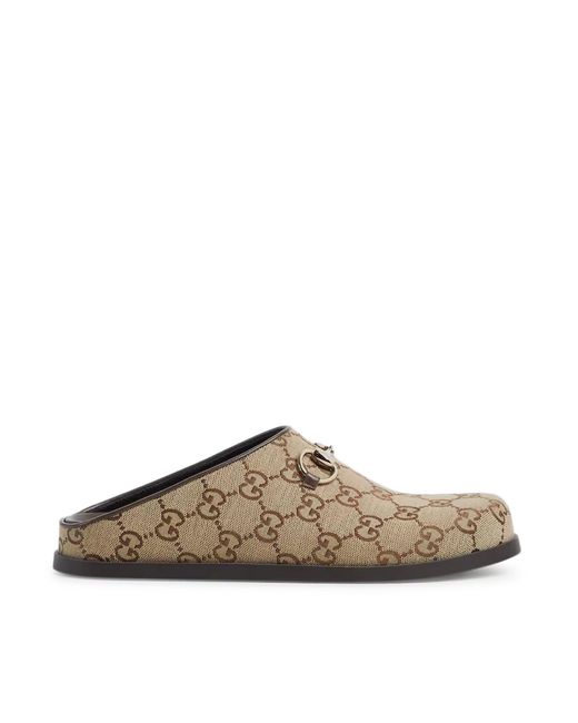 Sabot donna con morsetto di Gucci in Brown