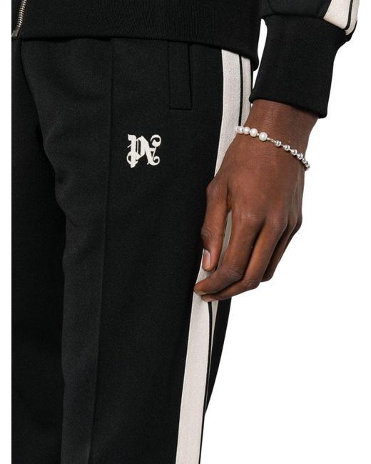 Pantaloni sportivi monogram di Palm Angels in Black da Uomo