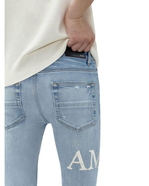 Jeans mx1 con logo boucle di Amiri in Blue da Uomo