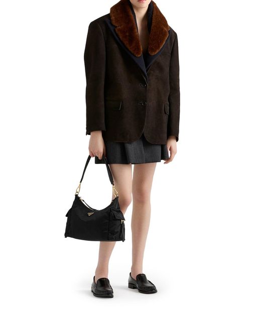 Borsa explore large in re-nylon e pelle di Prada in Black