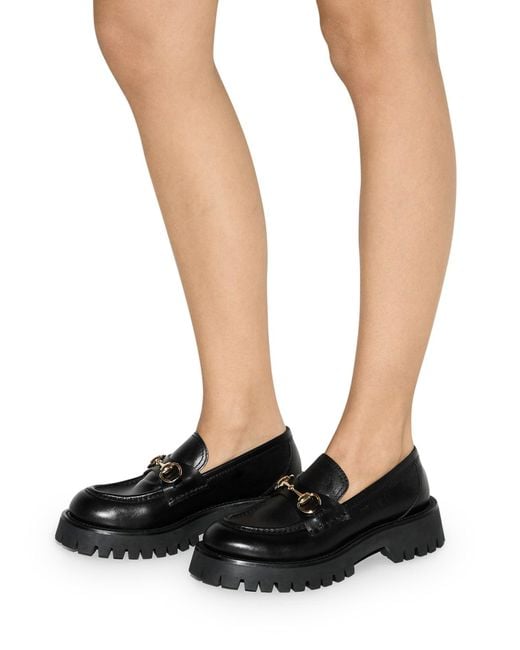 Mocassino da donna con suola a carrello e morsetto di Gucci in Black