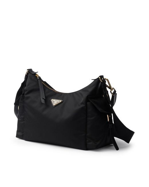 Borsa explore large in re-nylon e pelle di Prada in Black