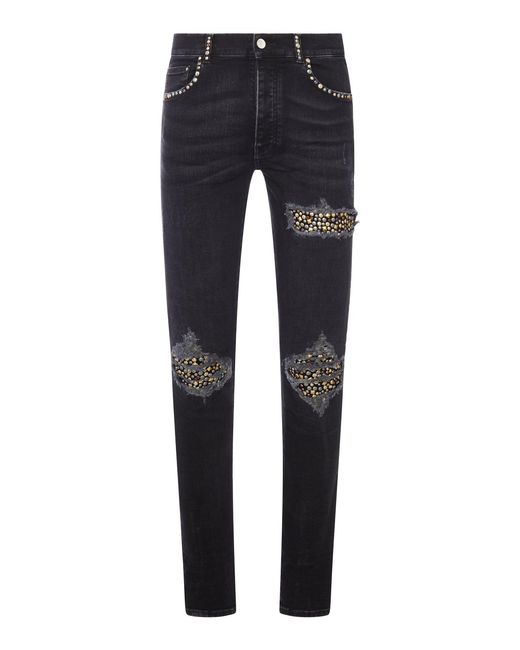 Amiri Blue Skinny Jeans With Studs And Destroy Details for men