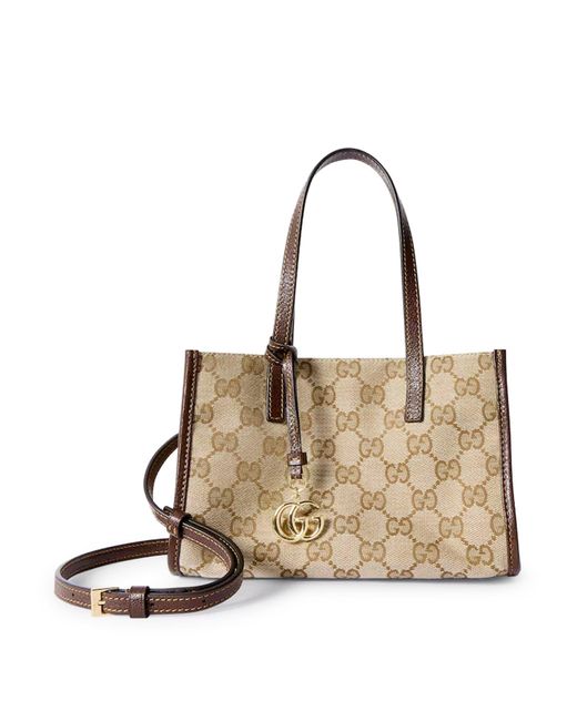 Small tote bag con ciondolo gg di Gucci in Natural