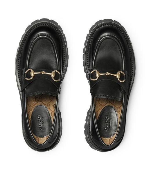 Mocassino da donna con suola a carrello e morsetto di Gucci in Black