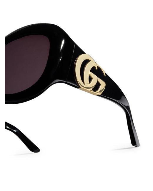 Occhiali da sole rotondi di Gucci in Purple