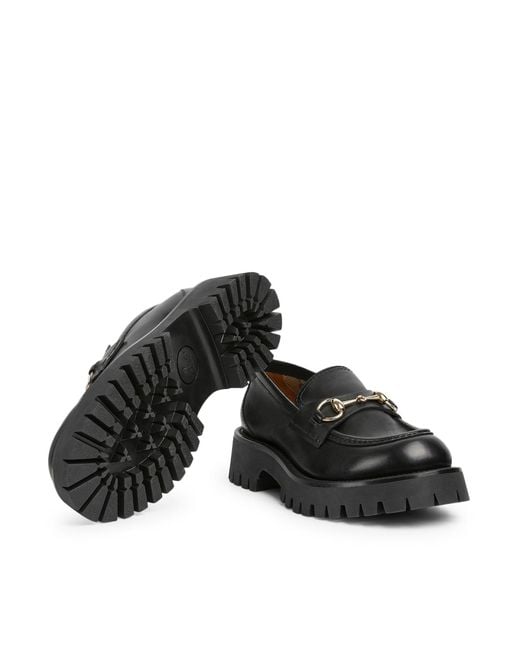 Mocassino da donna con suola a carrello e morsetto di Gucci in Black