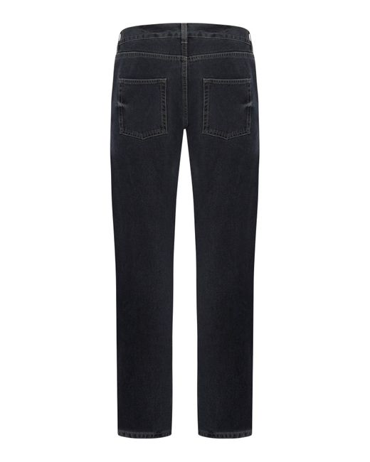 Jeans slim fit in denim nero scuro di Saint Laurent in Blue da Uomo