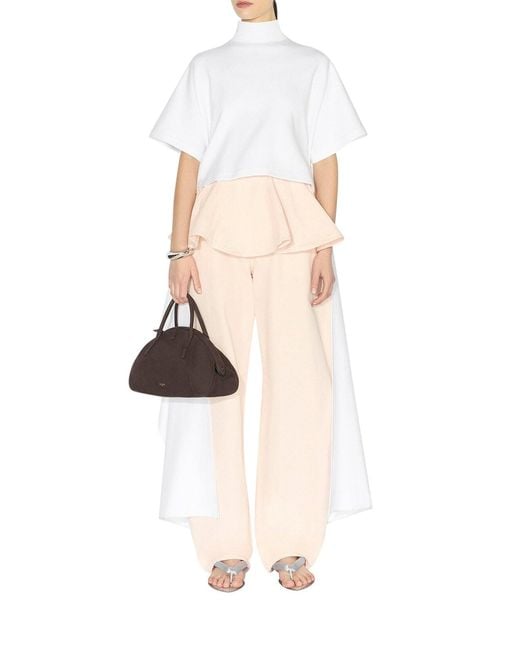 Alaïa White Round Cotton Denim Trousers