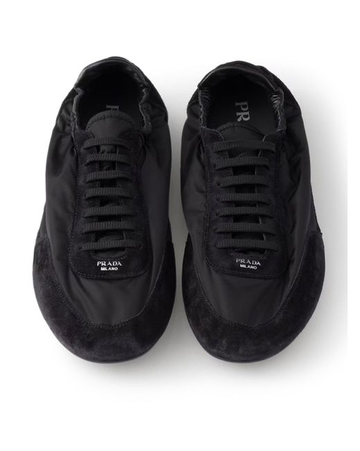 Sneakers collapse in re-nylon e pelle scamosciata di Prada in Black da Uomo