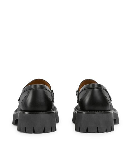 Mocassino da donna con suola a carrello e morsetto di Gucci in Black
