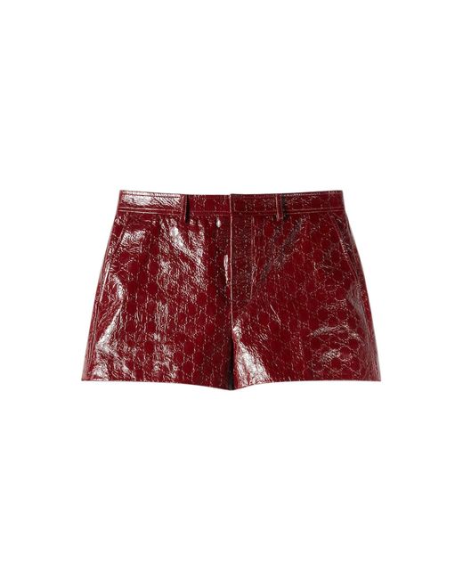 Shorts in pelle lucida con motivo gg in rilievo di Gucci in Red