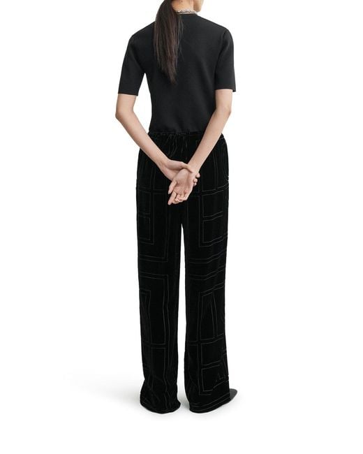 Totême Black Velvet Trousers With Dãvorã Monogram