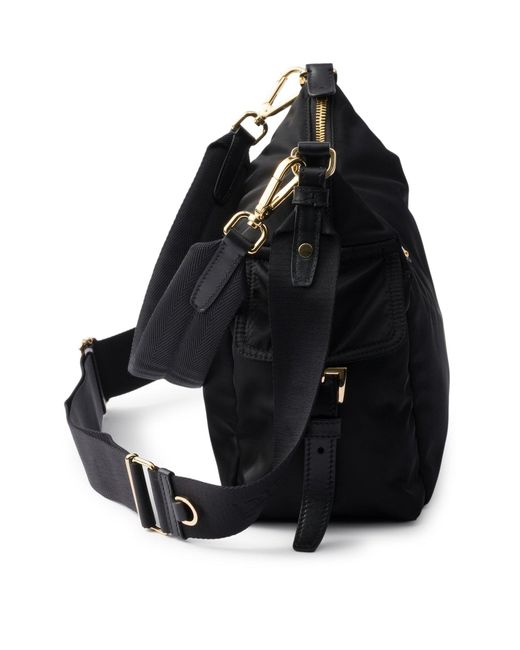 Borsa explore large in re-nylon e pelle di Prada in Black