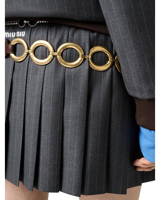 Minigonna in gessato plissÉ di Miu Miu in Gray