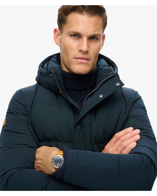Superdry Blue Classic Quilted Everest Short Hooded Puffer Jacket for men