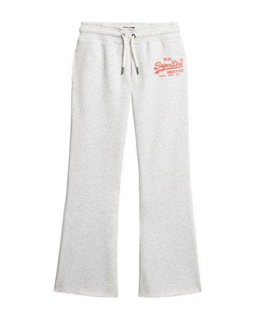 Superdry White Ladies Classic Embroidered Neon Vintage Logo Low Rise Flare joggers