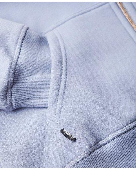 Sweat à capuche zippé à logo essential Superdry en coloris Blue
