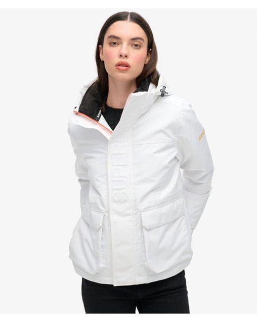 Veste à capuche ultimate windbreaker Superdry en coloris White