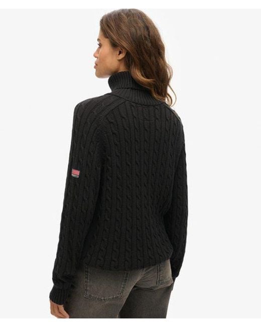 Pull ample torsadé à col roulé Superdry en coloris Black