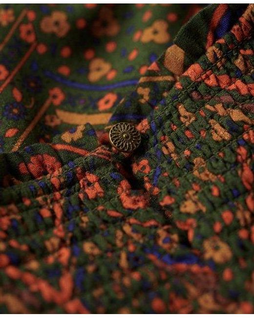 Robe longue smockée imprimée Superdry en coloris Brown