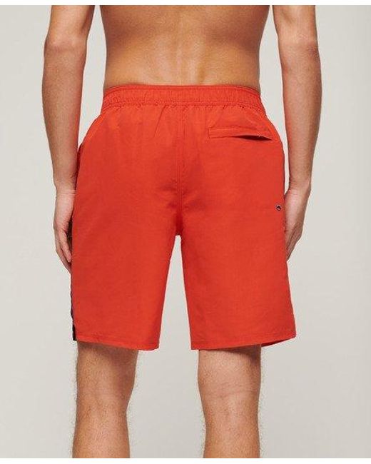 Short de surf recyclé 48 cm à logo sportswear Superdry pour homme en coloris Red