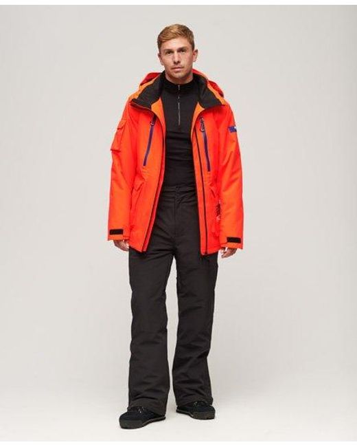 Pour des s impression du logo sport veste de ski ultimate rescue Superdry pour homme en coloris Red