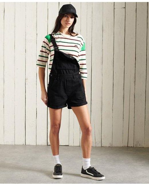 black denim dungaree shorts
