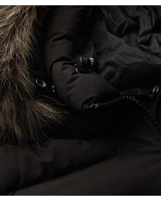 Veste longue à capuche en fausse fourrure fuji Superdry en coloris Black