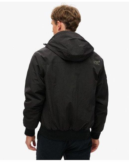 Superdry Black Classic Embroidered Logo Surplus Nylon Hooded Bomber Jacket for men