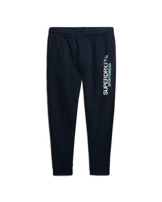 Superdry Taps Toelopende joggingbroek Met Sportswear-logo in het Blue voor heren