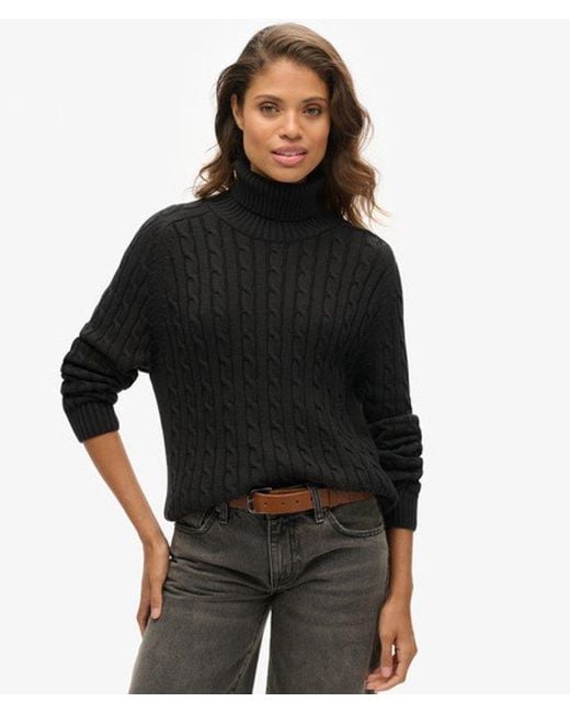 Pull ample torsadé à col roulé Superdry en coloris Black