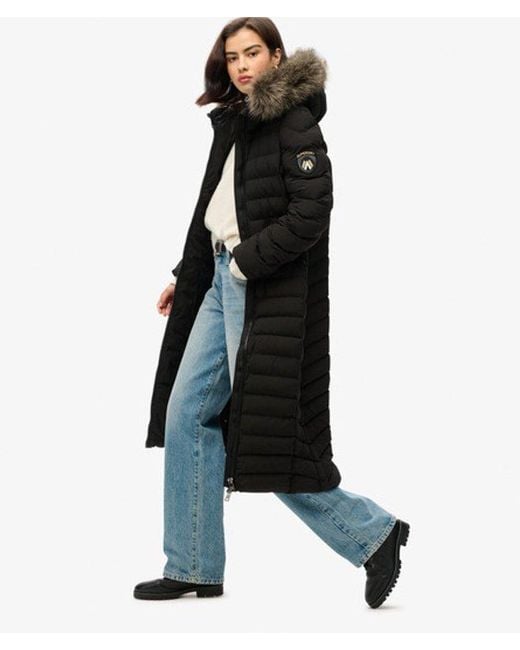 Veste longue à capuche en fausse fourrure fuji Superdry en coloris Black