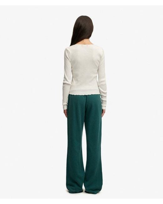 Superdry Green & Co Embroidered Athletic Essentials Low Rise Flare joggers